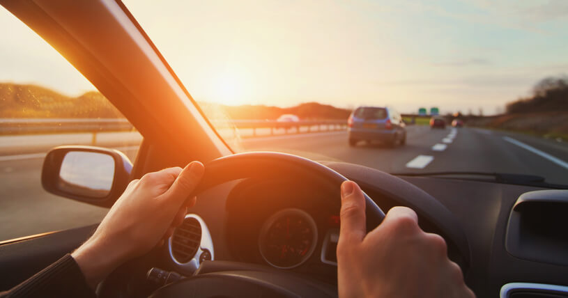driver speeding down the highway