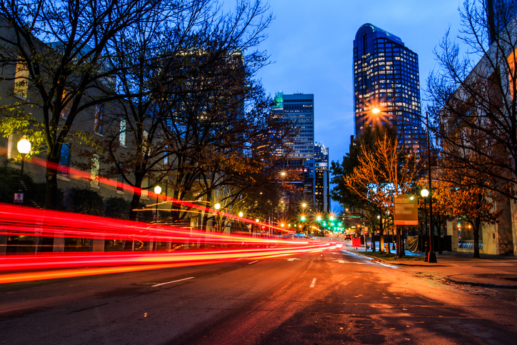Traffic speeding through the city at night